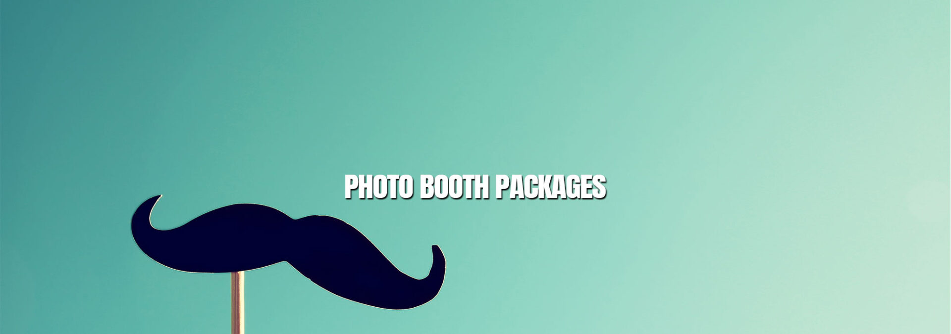 A mustache with the words photo booth packages in front of it.